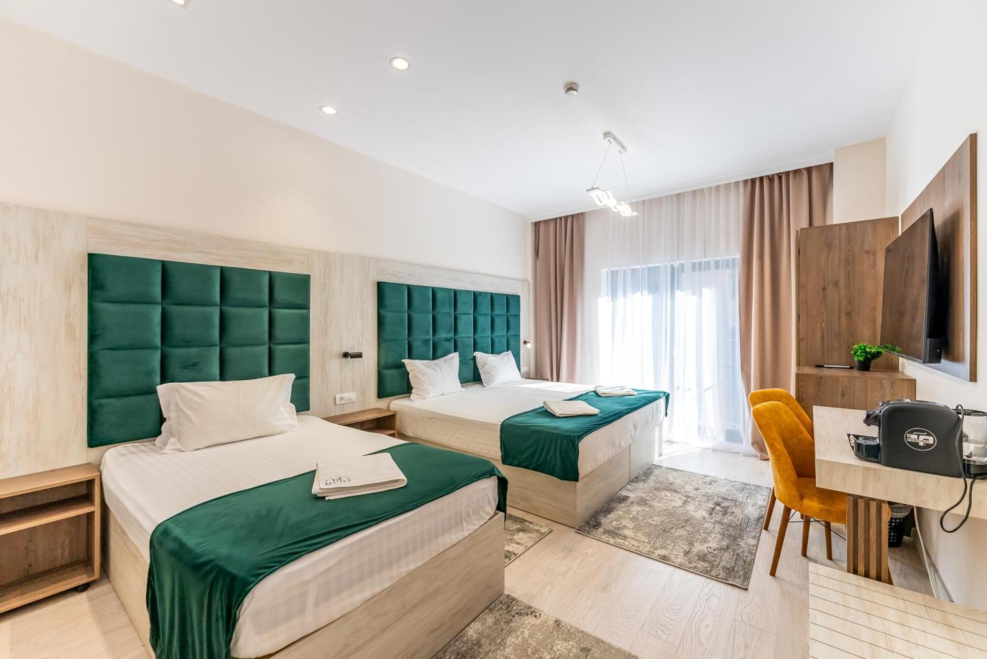 M City Aparthotel Arad Quarto foto